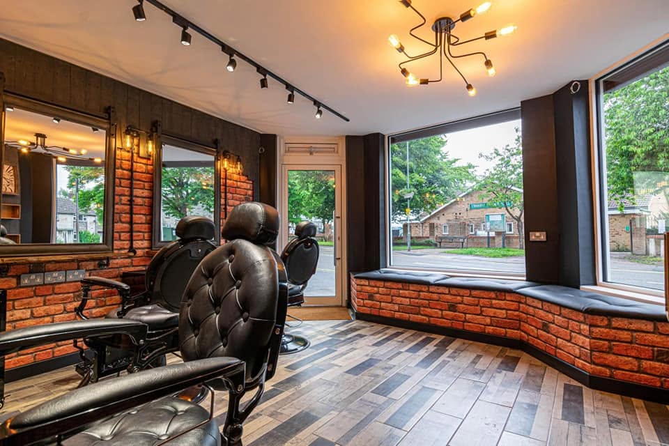 The window seat and barber chairs inside Sizzas